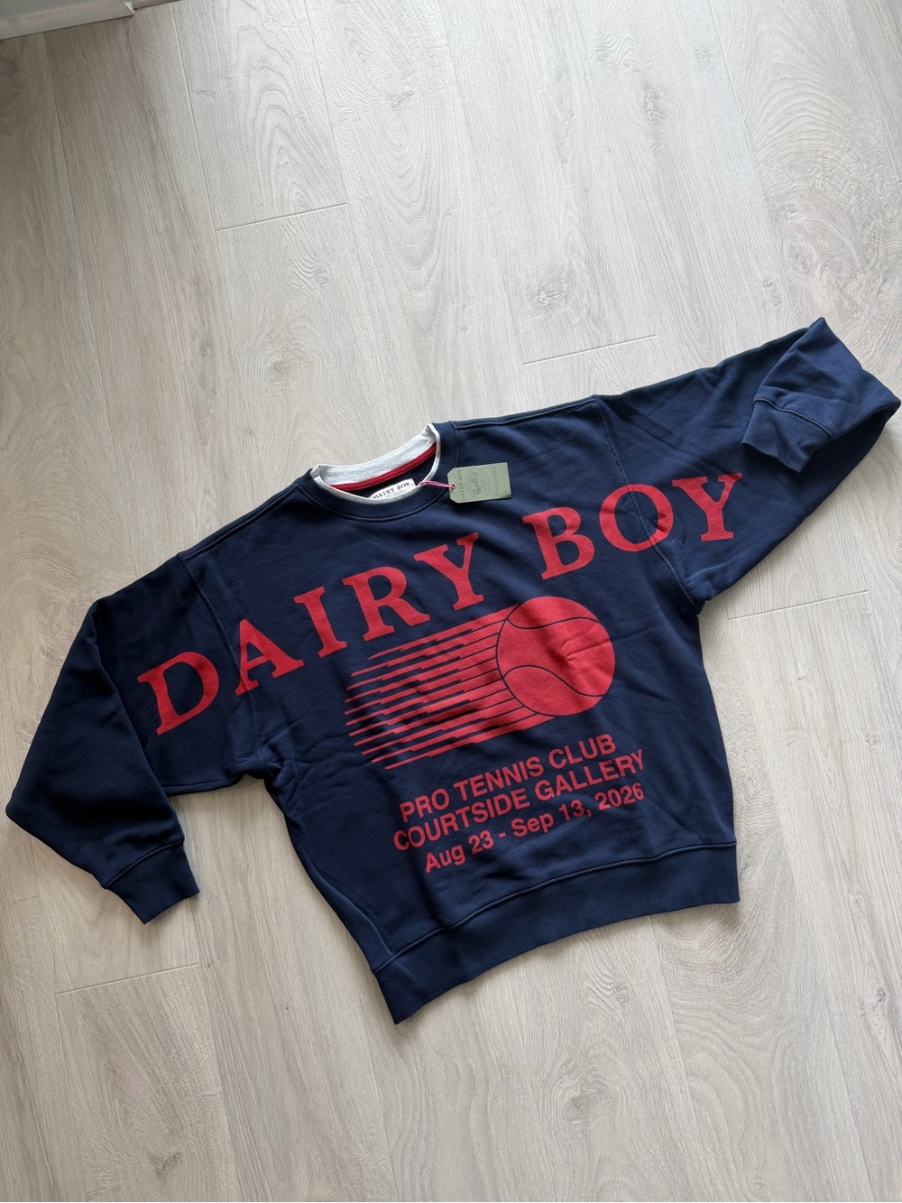 Dairy Boy Navy Sweatshirt with Red Tennis Graphic